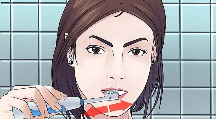 Chải từ phía ngoài của răng đến bề mặt bên trong